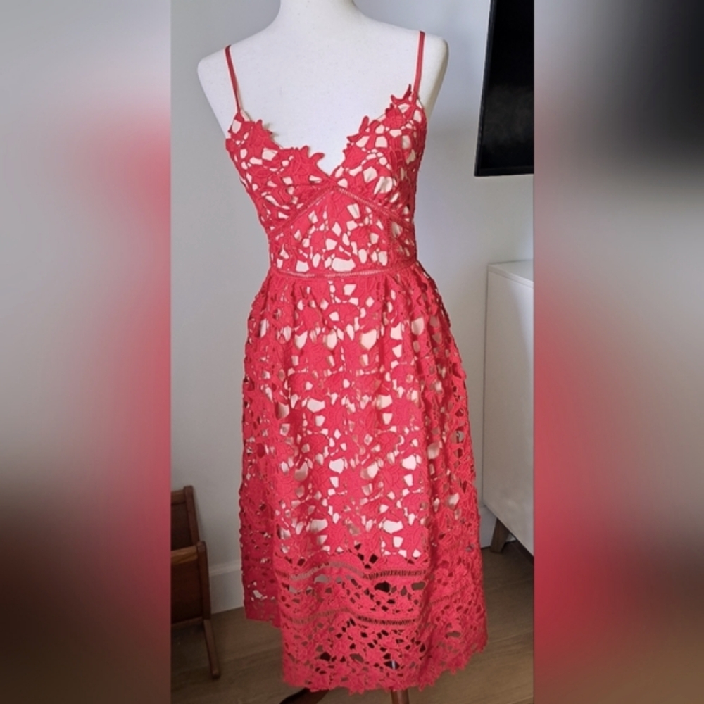 Beautiful Red Lace Dress Size S. Side Pockets. Back Zipper. Great Condition.